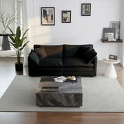 Black chenille loveseat in elegant living room