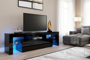 Modern black glossy TV stand with blue LED lights in beautifully styled living room